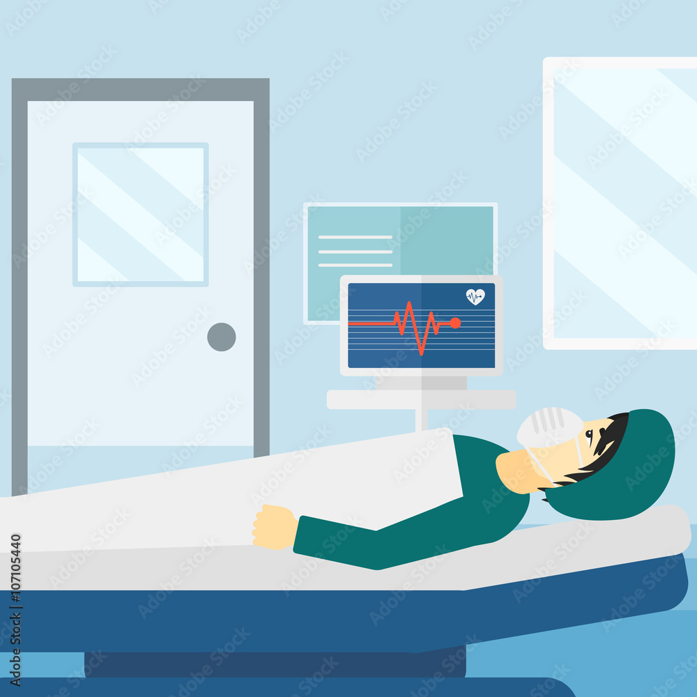 Obraz premium Patient lying in hospital bed with heart monitor.
