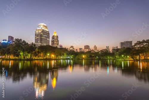 City at twilight view of Bangkok from Lumpini Park, Thailand. © sorranop01