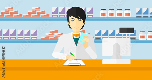 Pharmacist taking notes.