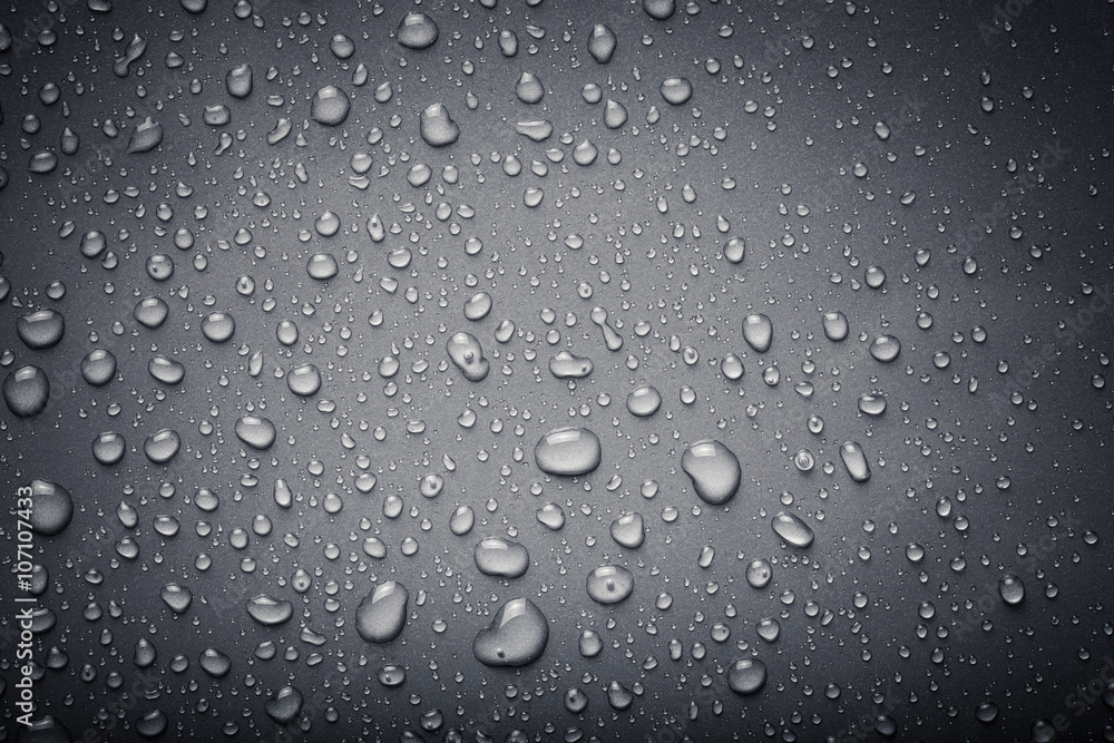 Dops of water on a color background. Gray. Toned Dops of water on a color background. Gray. Toned