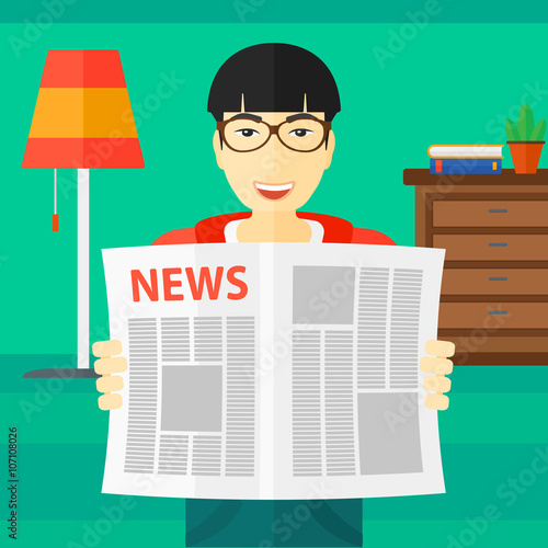 Reporter reading newspaper.