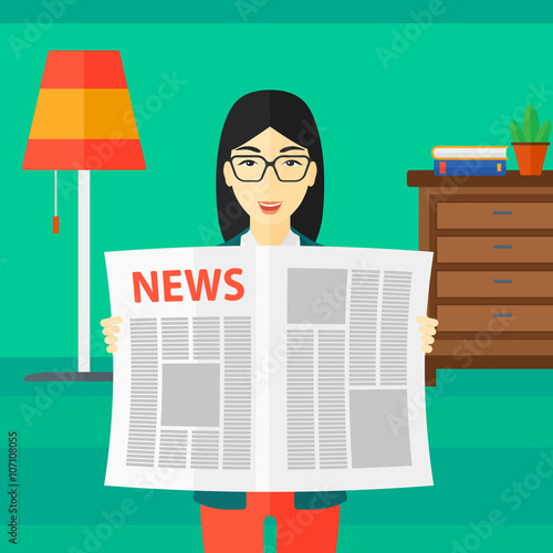 Reporter reading newspaper.