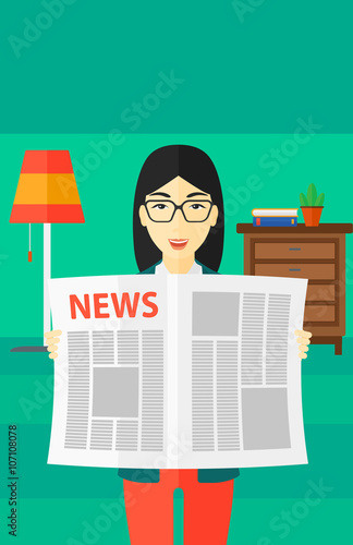 Reporter reading newspaper.
