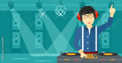Smiling DJ with console.