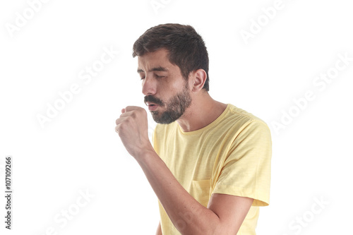 Respiratory disease. Young man coughing on white background