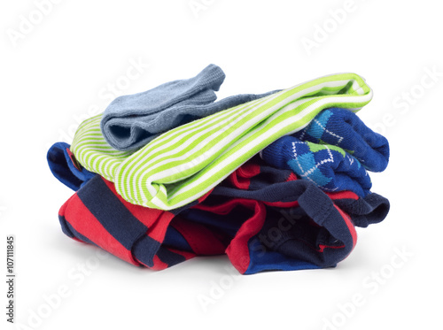pile of new children's clothing isolated on white