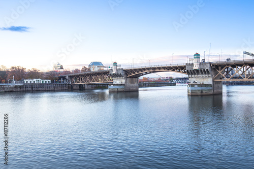 bridge over water in blue sky in portland © zhu difeng