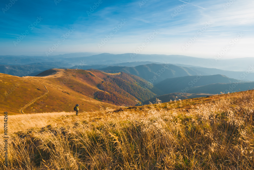 Fototapeta premium Photographer in a mountains