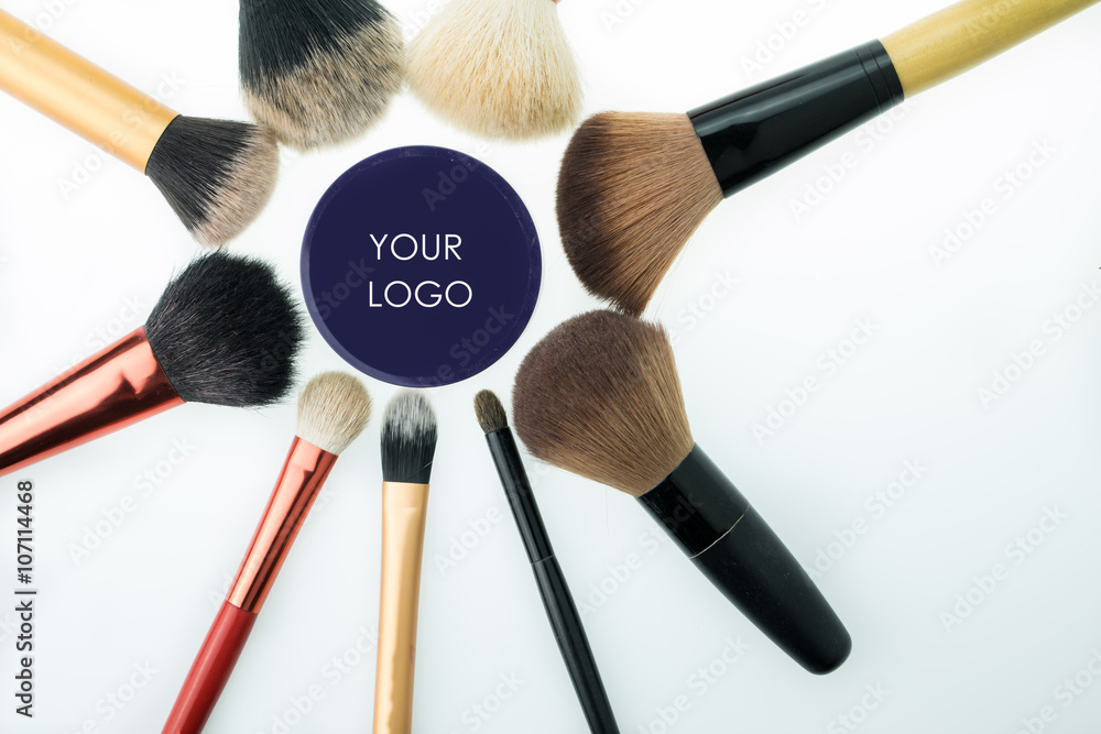 Various makeup products on white background with copyspace Various makeup products on white background with copyspace