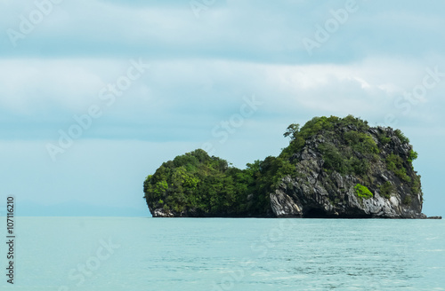 Fototapeta Naklejka Na Ścianę i Meble -  Blue Sea and Sky with Turtle like Shape Island at The Corner with Copyspace to input Text, Thailand
