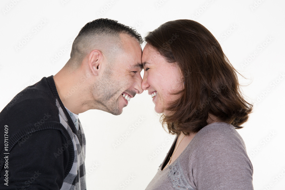 Happy couple happy hugging isolated on white Happy couple happy hugging isolated on white