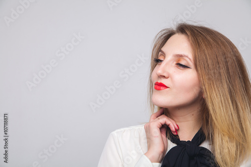 portrait of a beautiful blond white background emotions