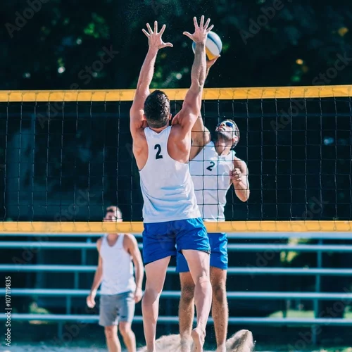 Obraz Siatkówka plażowa męska, blokowanie kolca