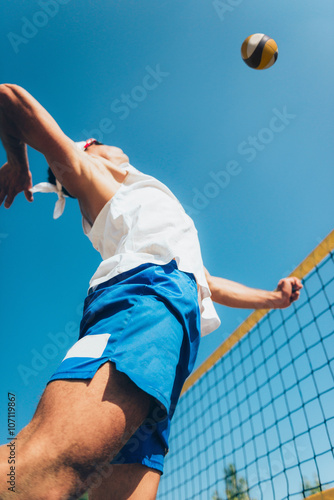 Beach volleyball jump spike