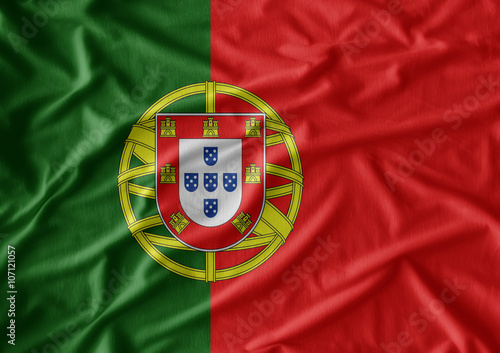 Waving flag of Portugal. Flag has real fabric texture