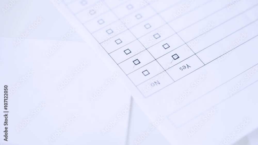 hands filling checklist and answering with no hands filling checklist and answering with no