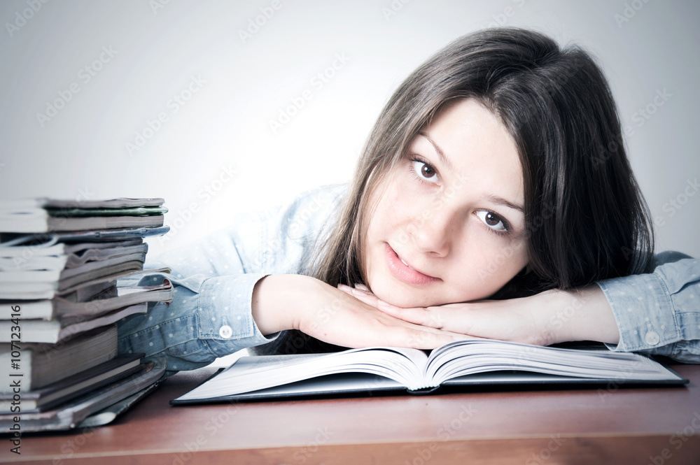 Cute smart young girl studying. Cute smart young girl studying.