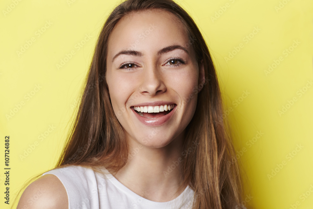 Beautiful and smiling young woman in studio Beautiful and smiling young woman in studio