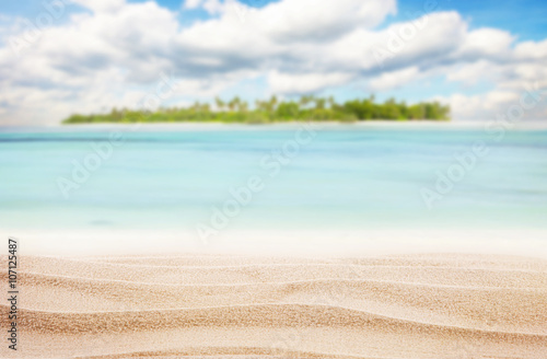 Fototapeta Naklejka Na Ścianę i Meble -  Sandy tropical beach with island on background