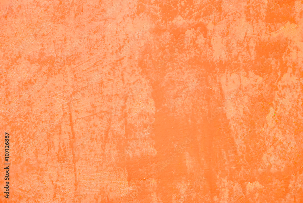 Cement background with a texture of orange wall