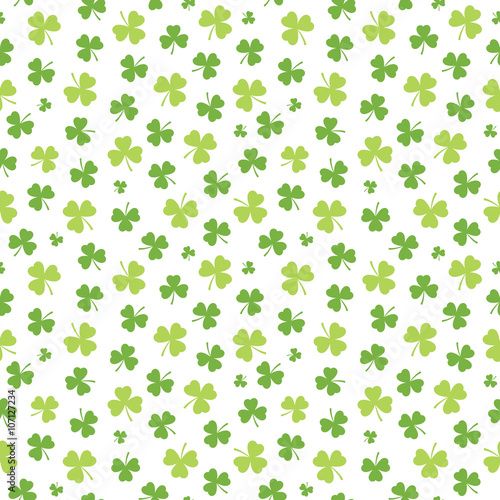 Seamless Irish background pattern for St Patrick's Day with shamrocks in green and white. St Patrick's Day, giftwrap, wallpaper, textiles.