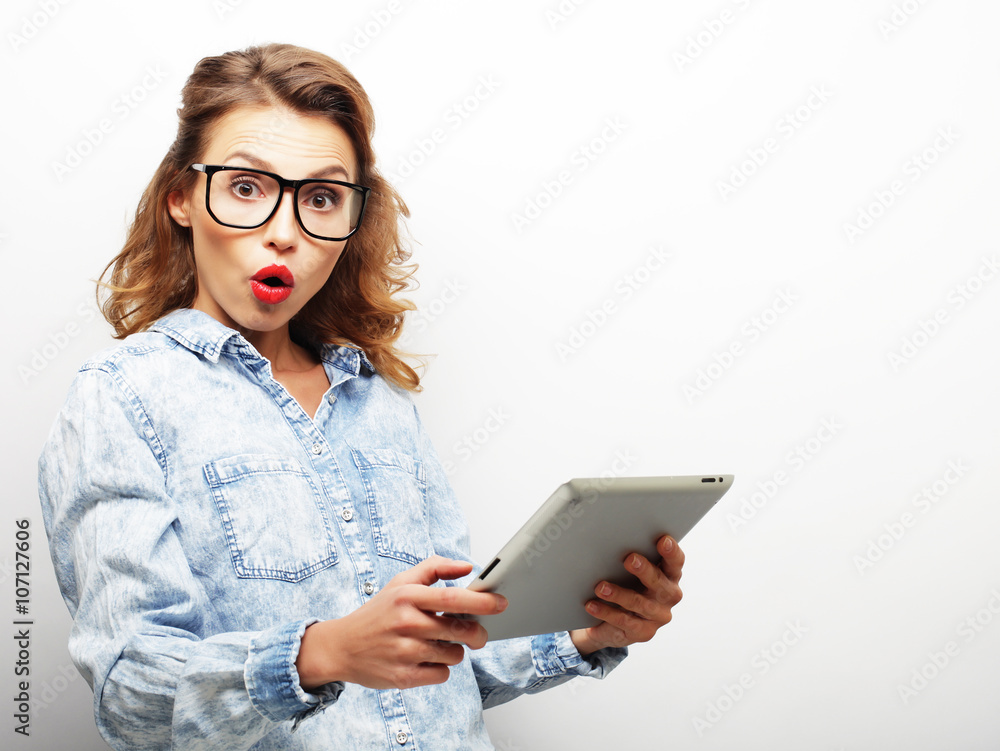 happy teenage girl wearing glasses with tablet pc computer happy teenage girl wearing glasses with tablet pc computer