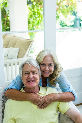 Happy senior couple embracing 