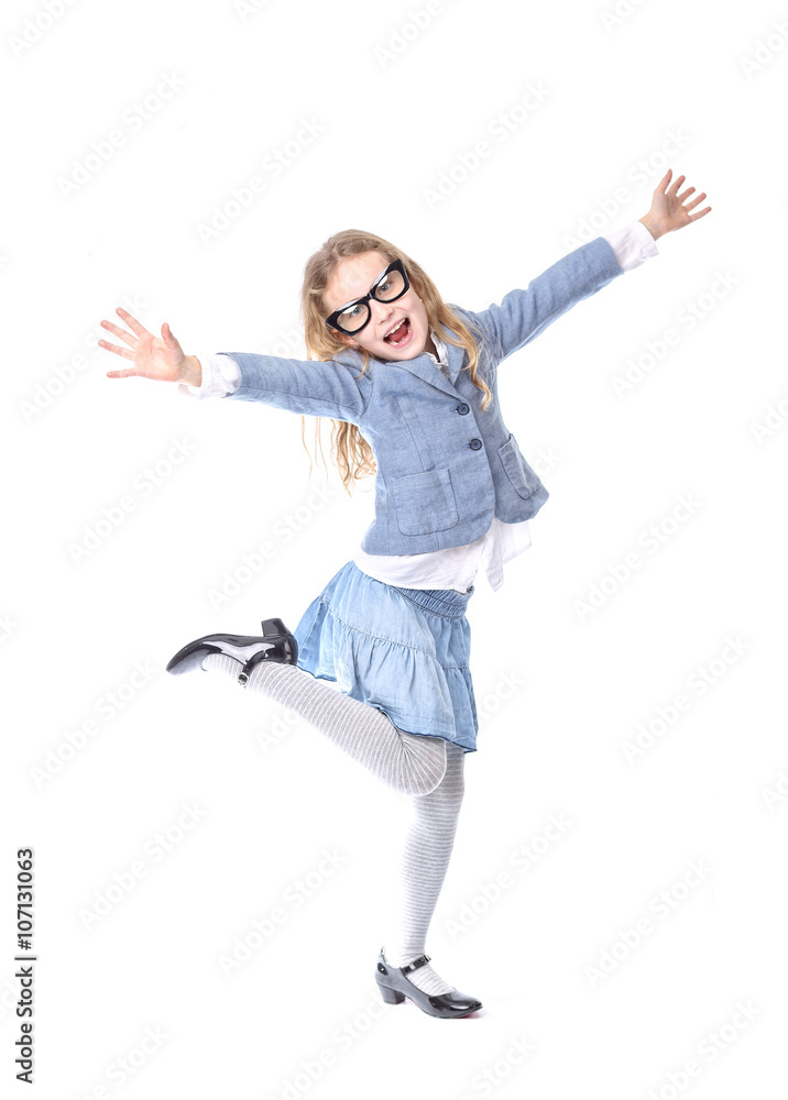 Young girl dancing on a white background