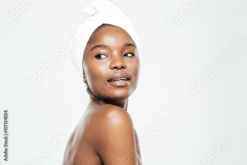 Afro american woman with towel on head