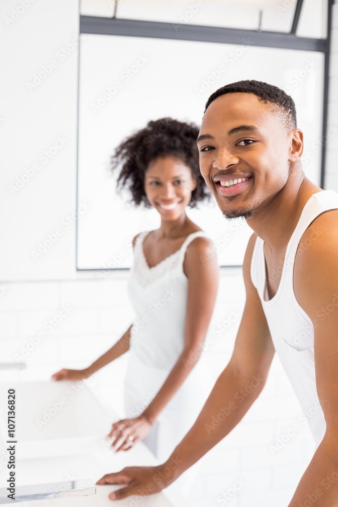Portrait of happy couple in bathroom Portrait of happy couple in bathroom