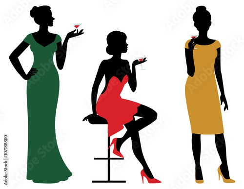 Silhouettes of women dressed in evening dress holding wine glass