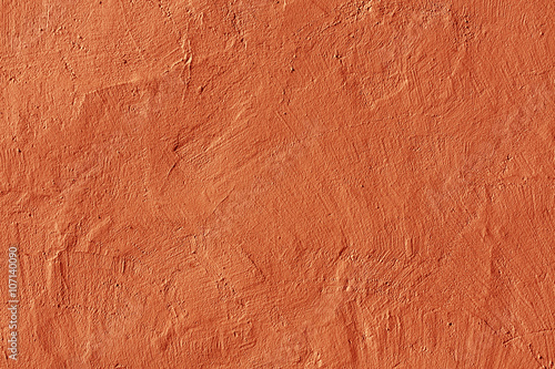 Fotografia Abstract orange plaster wall texture.