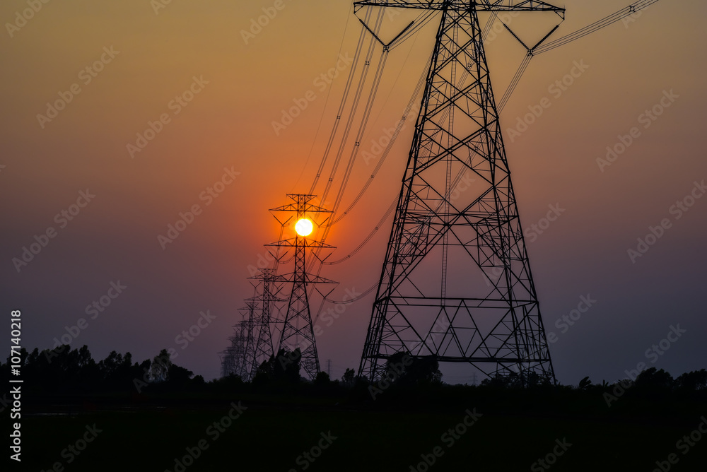 sunset over High voltage pole