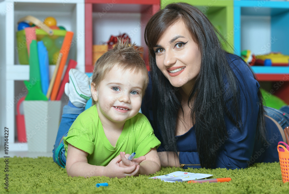 little boy with mother at home little boy with mother at home