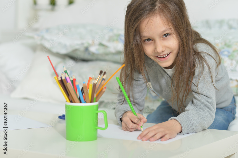 Little girl drawing at home Little girl drawing at home