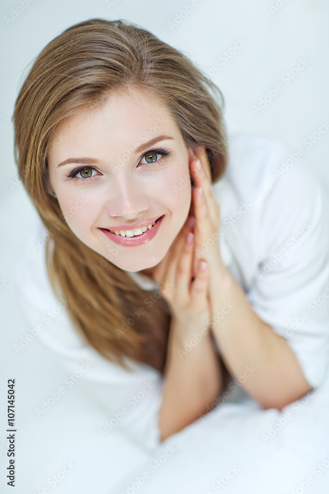 Portrait of a beautiful woman in the morning bed Portrait of a beautiful woman in the morning bed