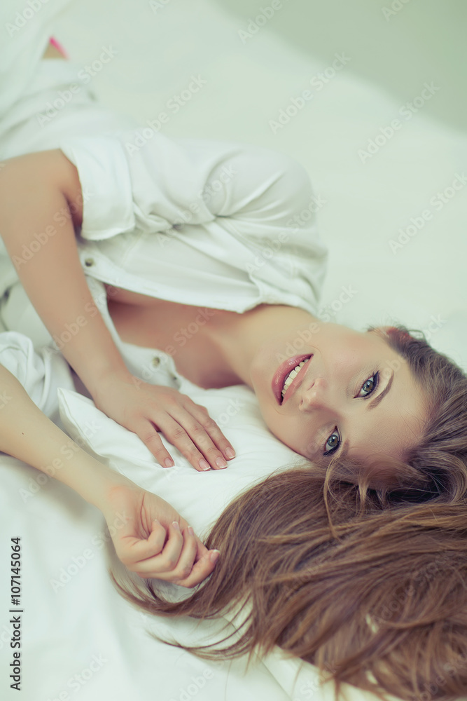 Portrait of a beautiful woman in the morning bed Portrait of a beautiful woman in the morning bed
