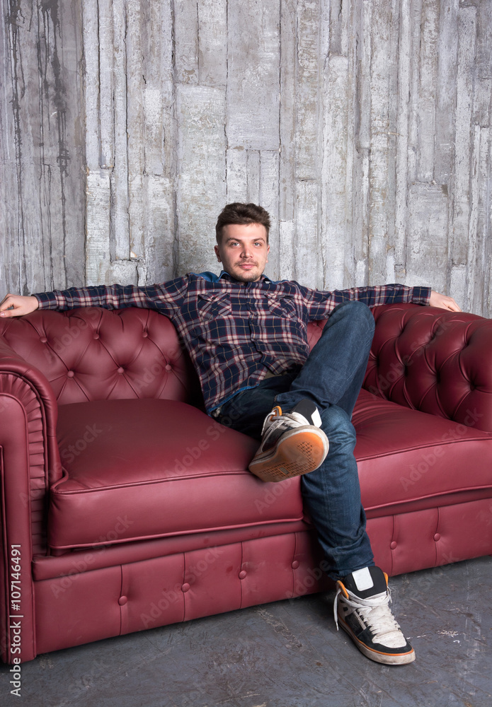 Young man on the couch Young man on the couch