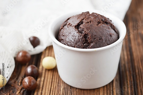 Chocolate muffin on a wooden table