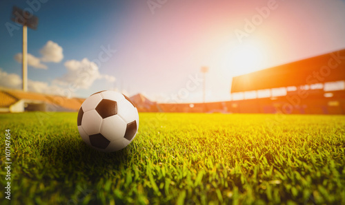 Soccer ball on the grass  grass in soccer stadium , sunset © FocusStocker