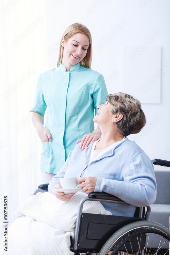 Obraz premium Elderly female on wheelchair