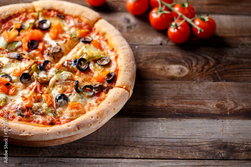 Vegeterian pizza with mushrooms and olives