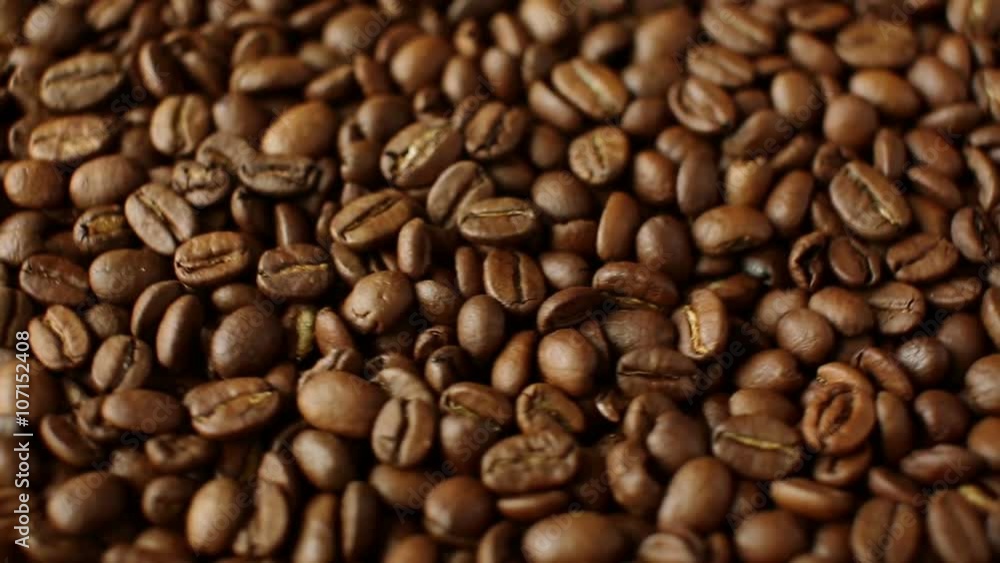 Rotation of aromatic roasted coffee beans Rotation of aromatic roasted coffee beans