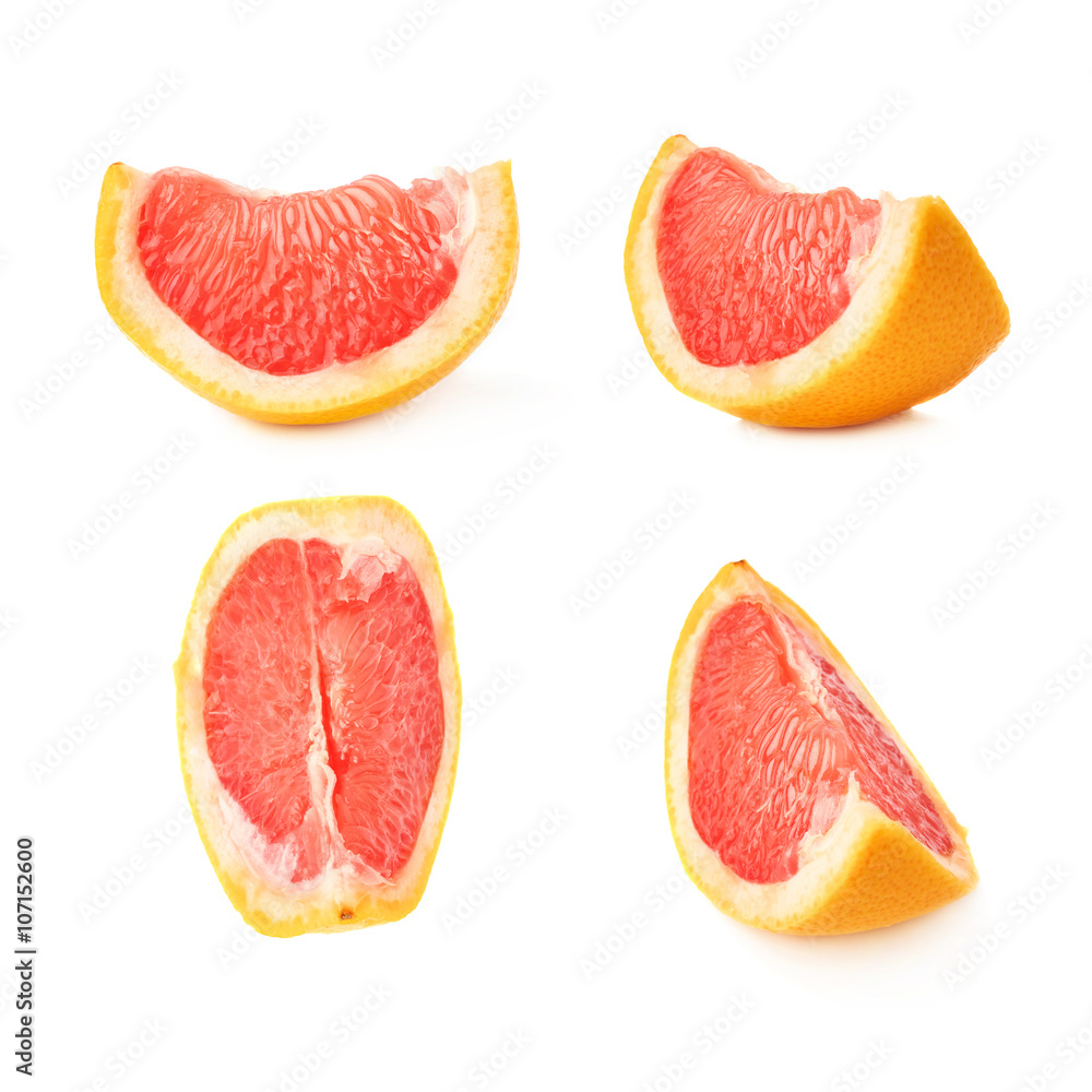 Slice section of grapefruit isolated over the white background Slice section of grapefruit isolated over the white background