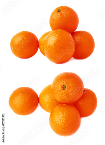 Pile of multiple ripe oranges, isolated over the white background, set of different foreshortenings