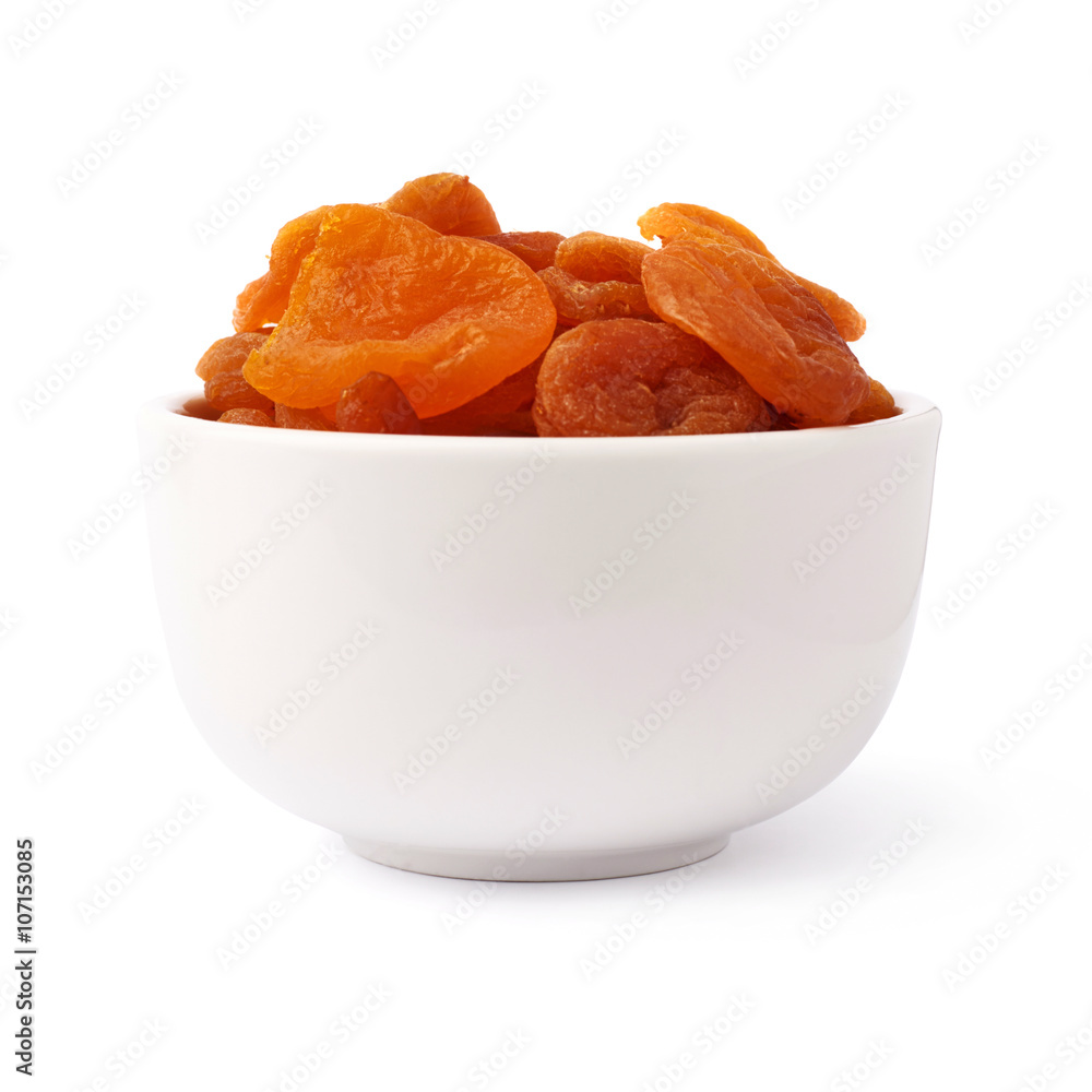 Dried orange apricots over white background Dried orange apricots over white background
