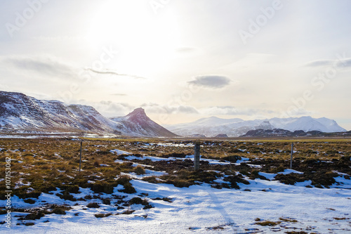 Mountain and Field covered with some snow during winter in Iceland © jum_ruji