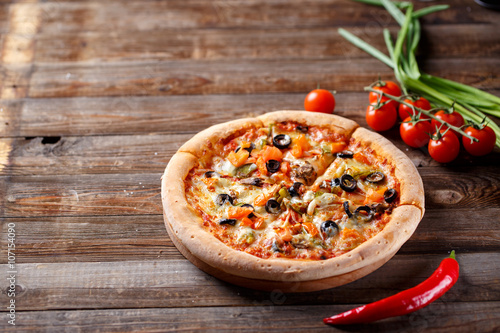 Pizza with tomato, mushroom and olives