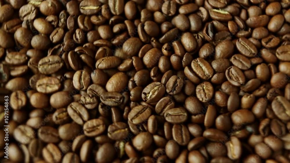 Rotation of aromatic roasted coffee beans Rotation of aromatic roasted coffee beans