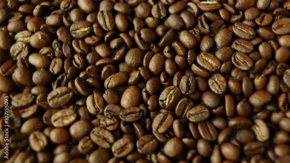 Rotation of aromatic roasted coffee beans Rotation of aromatic roasted coffee beans
